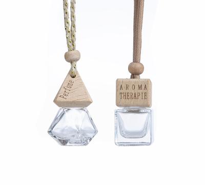 China Angular Blush Aroma Car Perfume Bottle Car Essential Oil Glass Hanging Bottle for sale