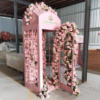 China Silk Flower+foam+metal Customized Design Art Installation Floral Telephone Box Wedding Events Artificial Rose Flower Pink Telephone Booth With Flower for sale