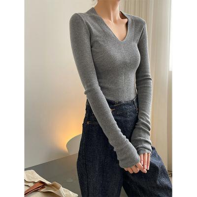 China Anti-Wrinkle Knitted Woolen Fashionable Sweater Jumper New Comfortable Soft Waxy Thin Sweater V Collar For Women for sale