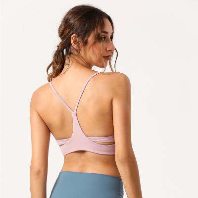 China Sweat-Wicking 2021 new yoga suit sports wear gym clothes seamless top bra and yoga wear fitness vest for sale