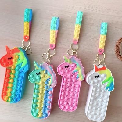 China Hot selling 2022 mini fashion child popit pencil case little girls cute unicorn silicone coin purse for kids for sale