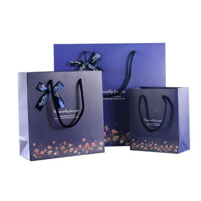 China Faye Recyclable Custom Fancy Wedding Gift Bag Logo Printing Fashion Packaging Paper Bag With Handle for sale