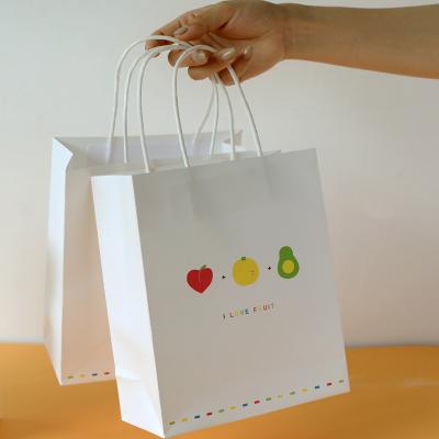 China Disposable Wholesale Customized Logo Boutique Bag Fashion Shopping Bag Kraft Paper Bags for sale