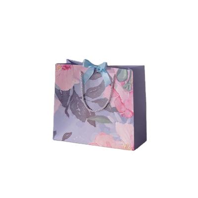 China Small Recyclable Custom Logo Rose Printing Bag For Party Wedding Favor Bag Jewelry Packaging Bag With Bowknot Handles for sale