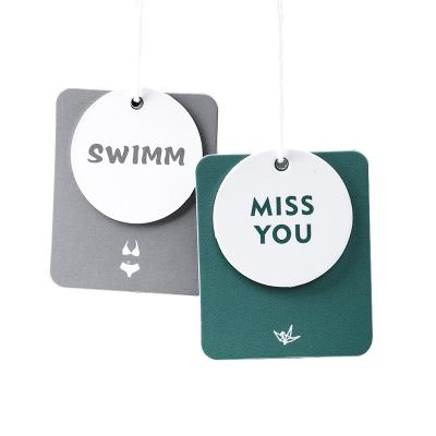 China China Viable Manufacturer Fashion Apparel Hang Tags Gold Garment Swing Label Special Paper Custom Printed Brand Logo Swing Hang Tags for sale