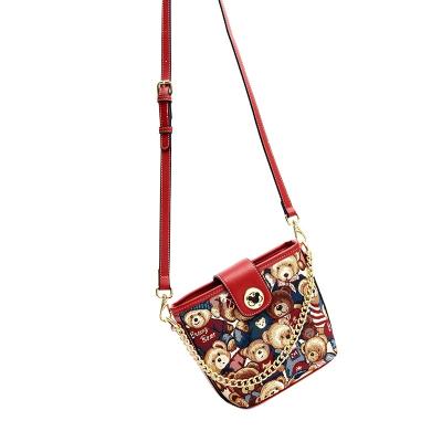 China Fashion metal buckle cartoon bear shoulder bag jacquard fashion gold chain cost-effective good quality soft cute handbag for sale