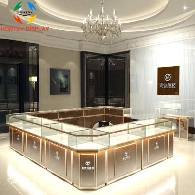 China Aluminum+Tempered Glass+UV Best Quality Glod Store Interior Design Jewelry Store Furniture Design In Euro Jewelry Showcase for sale