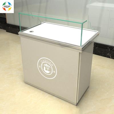 China Popular Glass Cashier Desk Retail Store Custom Logo And Lockable Glass Shop Cashier Desk For Retail for sale