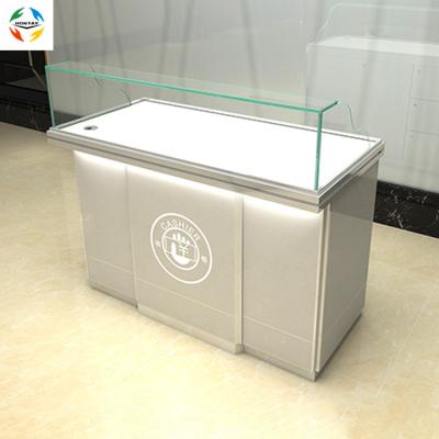 China Convenience Checkout Counter with Customized Logo Storge Cabinet Shop Shop Convenience Checkout Counter Modern Retail Storage Cabinet for sale