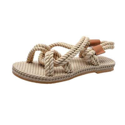 China 2021 Trend Fashion Trend Handmade Rope Women's Flat Sandals Women's Straw Hemp Rope Beach Canvas Woven Slippers for sale