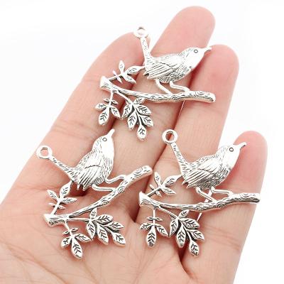 China FASHIONABLE Wholesale Silver Bird Charms Pendant With Branches For Bracelets Necklace Making Jewelry 38.5*35.5mm for sale