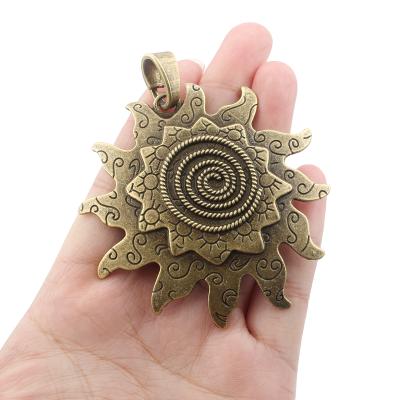 China FASHIONABLE Large Sun Bronze Silver Necklace Color Swirl Spiral Pendant Pattern For DIY Necklace Jewelry Making for sale