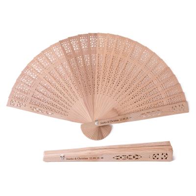 China Can use as a gift giving personalized engraved wooden favors and wedding favors for guest folding sandalwood hand fan party decoration fans for sale