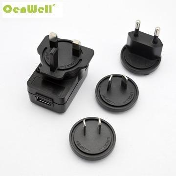 China Wall Mounted 4.5V0.6A AC To DC Adapter 6W Interchangeable Power Adapter With UK EU US AU Plug CW0450600 for sale