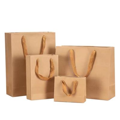 China Handmade Practical Hot Selling Recyclable Kraft Paper Bag Gift Bag Well-designed Recyclable Bag With Handles for sale