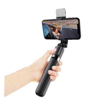 China Portable Flexible Sufficiency Light Wireless Tripod Mini Selfie Stick With Light Palos Selfie 360 ​​Degree Rotation for sale