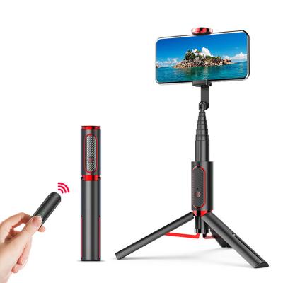 China New Portable Flexible Exquisite Retractable Selfie Stick Foldable Wireless Remote Control One-Piece Tripod Stand for sale