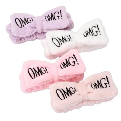 China New simple pilou letter sports hair band bow lady wash creative makeup plush headband for sale