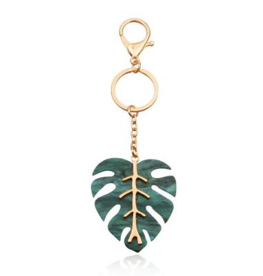 China Stainless Steel Metal Jewelry Leaf Shape Pendant Key Chain Plastic Key Chain Small Gifts for sale