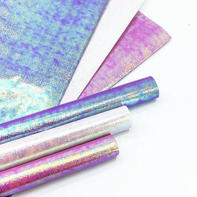 China Anti-curl special dusting paper wrapping fancy laser gold chromo paper wrapping paper 70*50cm for sale