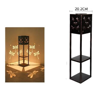 China Hot Sale Modern Amazon Dragon Metal Flower Stand Outdoor with Solar Light for Garden Decor for sale