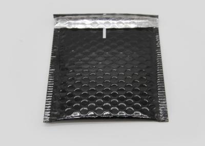 China Shiny Black Self Seal Bubble Mailers With Moisture Resistant Foil Film for sale