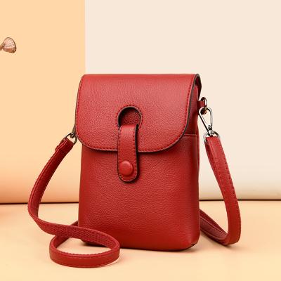 China Waterproof 2021 Women PU Leather Retro Latch Change Purse Solid Color Mobile Phone Bag for sale