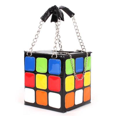 China Personality square Rubik's cube Rubik's cube handbag 2021 novelty women's and children's creativity clutch bag for sale