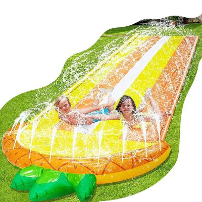 China PVC Lawn Water Slides for Kids, Center Sprinkler Inflatable Double Run Pineapple Play Slide Crash Protection for Kids Summer Swimming for sale