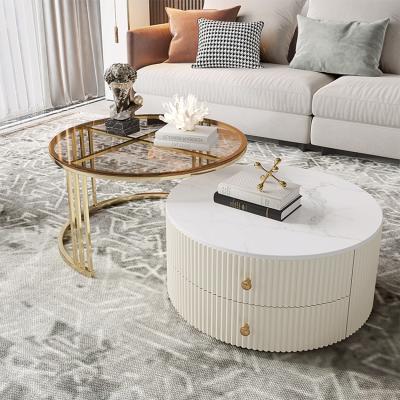 China Modern Simple Luxury Light Extendable Small Size Round Glass Tea Table Family Living Room Rock Dish Tea Table Combination for sale