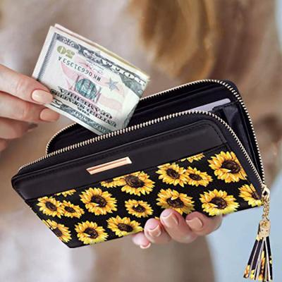 China Custom RFID Women PU Card Holder Clutch Leather Wallet Wristlet Wallet With Tassel Wrist Strap for sale