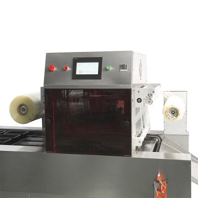 China Multifunctional Automatic Industrial Frozen Food Meat Tray Packing Machine for sale