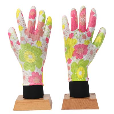 China Fire Proof 13 Gauge Flower Pattern Printed Nitrile Coated Ladies Work Gardening Gloves for sale