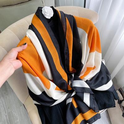 China Hot Selling Unique Winter Soft Touch Feeling H Printed Cotton Long Neck Wraps Shawl Fashion Scarves For Women for sale