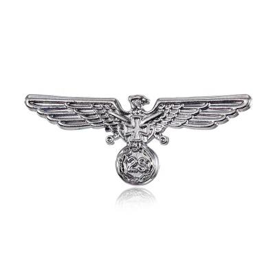 China Custom Cross Eagle High Quality Metal Collar Badge South America Metal Badge for sale