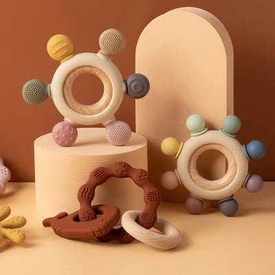 China Beech Wood Silicone Teething Ring Organic Rudder Baby Teether Chewable Toy Food Grade Eco-friendly Material Free for sale