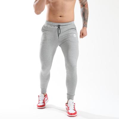 China Breathable Mid Waist Workout Pant Sweatpants Custom Mens Trotter Pants Casual Fitness Multi Pockets Shear Skinny Pant for sale