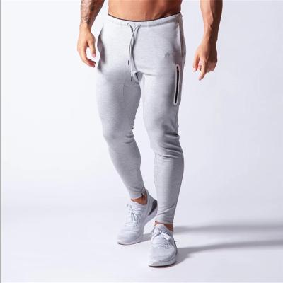 China Breathable Custom Stretched Workout Sweatpants Mens Jogger Pants Casual Fitness Multi Pockets Shear Skinny Panties for sale