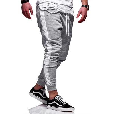 China Breathable Custom Stretched Polyester Sweatpants Men Workout Jogger Pants Casual Gym Fleece Skinny Running Panties for sale