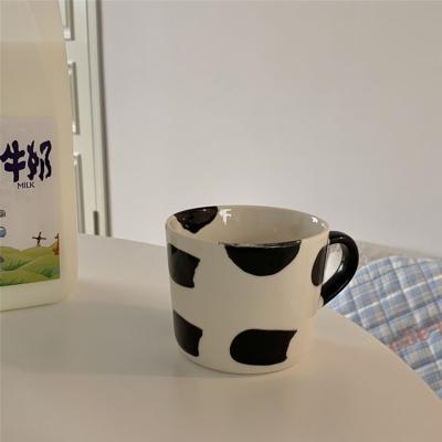 China Cutelife Viable White Black Cow Ceramic Coffee Mugs Coffee Cup Mug 400ml for sale