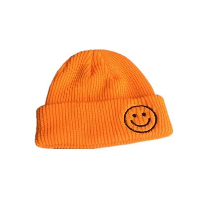 China breathable & New Winter Good Quality Waterproof Fashionable Women's Warm Knitted Hat Candy Colors Cute Smiley Face Wool Hat Beanie Knitted Hats for sale