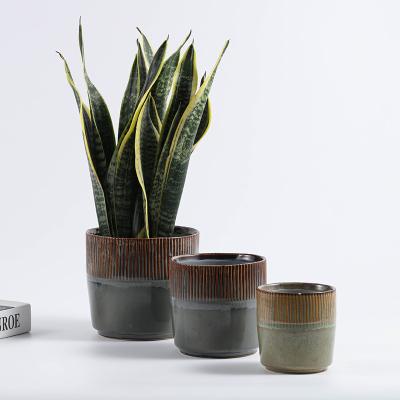 China Retro minimalist unique handmade circular ceramic vase in color interior decoration table top flowerpot for sale