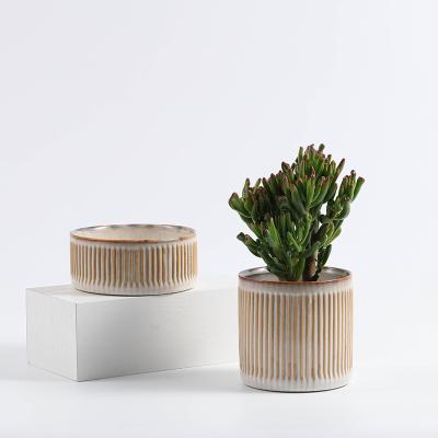 China Minimalist handmade creative design indoor table flower pots and green plant vases for sale