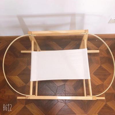 China Foldable Solid Wood Moses Basket Pine Rocking Rack For Baby for sale