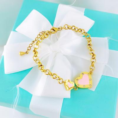 China Cute Wholesale Stainless Steel Double Heart Men Women Couple Bracelet 2019 Gold Plated Imitation Jewelry for sale