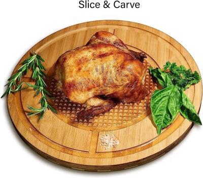 China Sustainable Round Serving Board with non-slip skid grid with Juice Groove Slice and Carving Steak and turkey serving board Bamboo material for sale