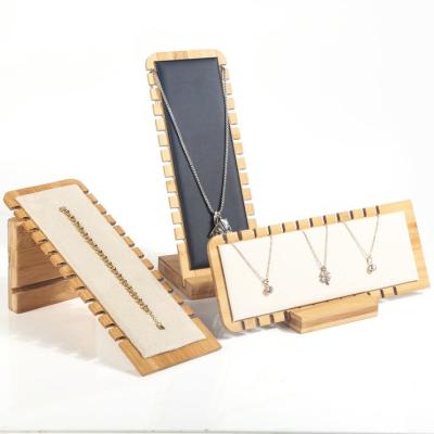 China L Type New Arrival Bamboo Wood Frame Assemble Durable L Type Beige Black White PU Suede Necklaces Display Stand for sale