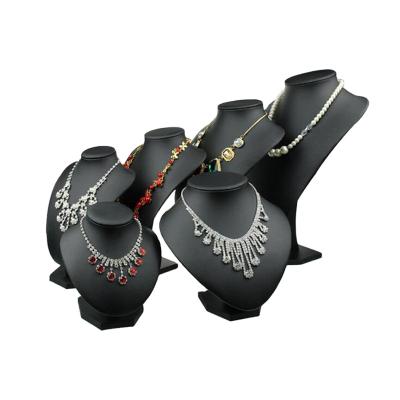 China Jewelry store display or home dressing table guaranteed quality unique black PU necklace stand jewelry display bursts stand for sale