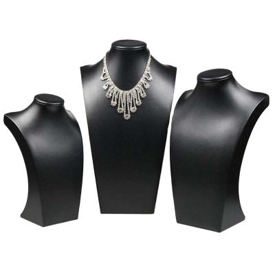 China Jewelry Store Display or Latest Home Dressing Table Design Top Quality Smooth Black PU Crystal Necklace Holder for sale