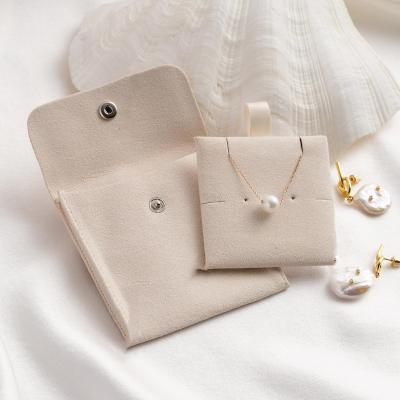 China Jewelry store display or dressing table home fashion cute color microfiber inset earring pad inside packaging jewelry box with custom logo velvet pouch pockets for jewelry for sale